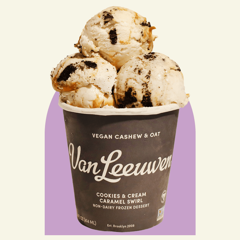 over scooped pint of vegan cookies and cream caramel swirl ice cream